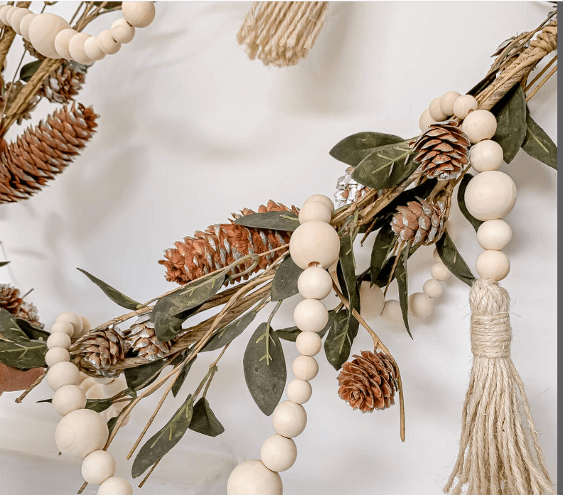 21 BEST SCANDINAVIAN CHRISTMAS DECORATIONS 2023 7 Natural Wood Bead Christmas Garland by Oh So Kel