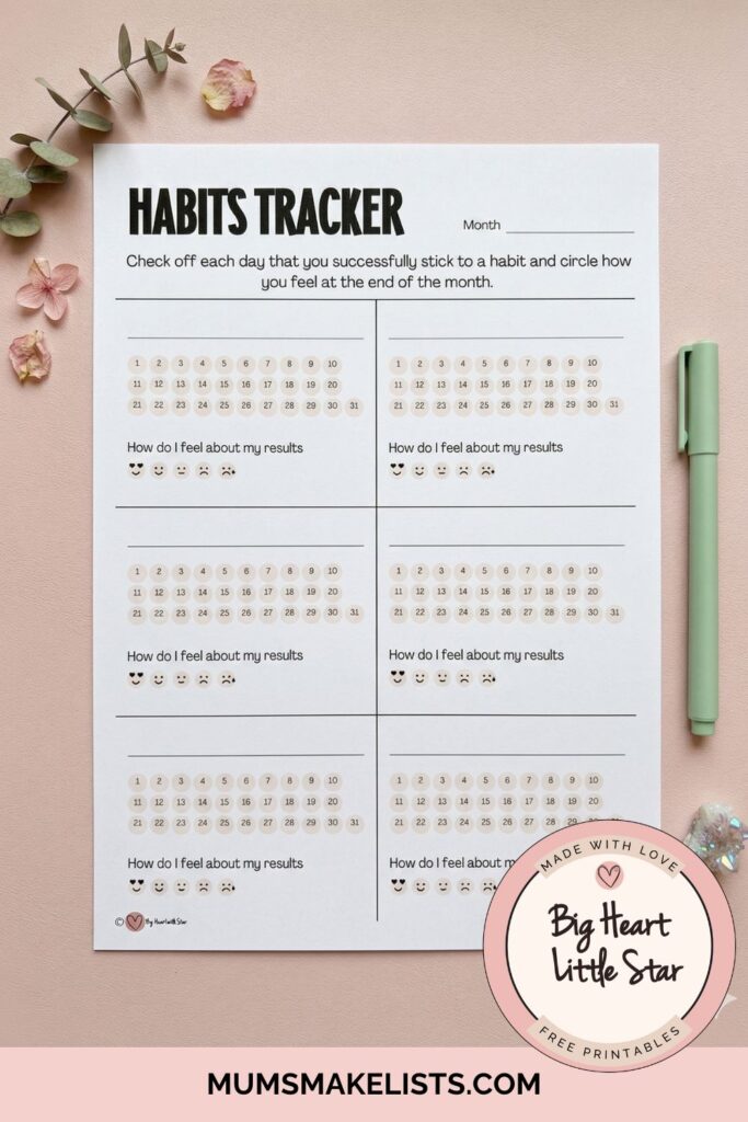 50 Habit Ideas To Help You Reset Your Life (Plus Free Printable) 2 FREE printable Habits Tracker on pale pink desk with green pen.