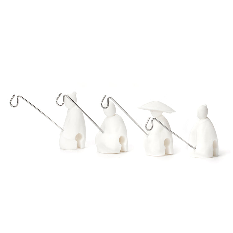 23 Stocking Stuffers for Women Under $20 19 Kikkerland Fishermen Tea Bag Holders, Set of 4